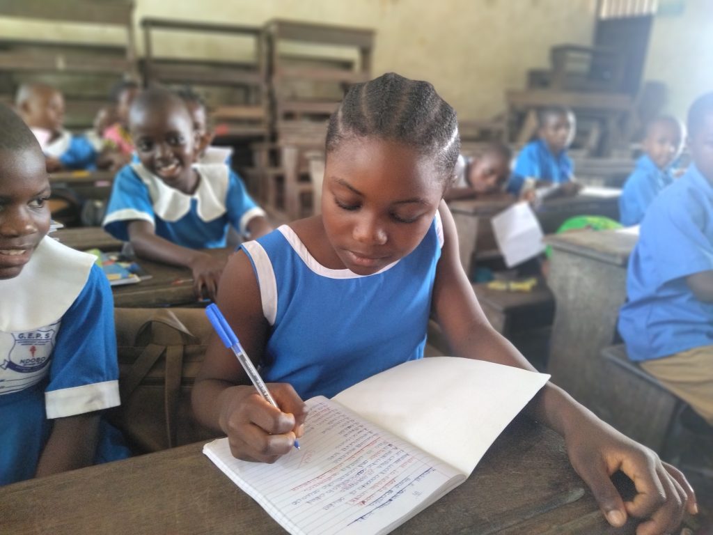 Bih*, age 13, lives in Cameroon with her mother and four siblings. Her ability to enrol in school was made possible through financial support and the provision of school supplies